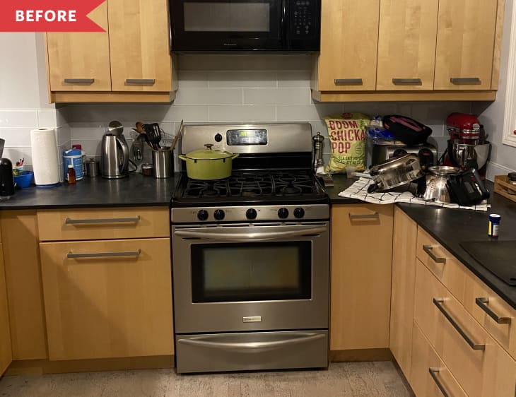Before: Kitchen with blonde wood cabinets and cork floors