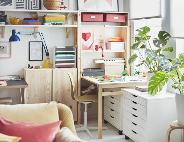 Craft room with IKEA shelves and drawers