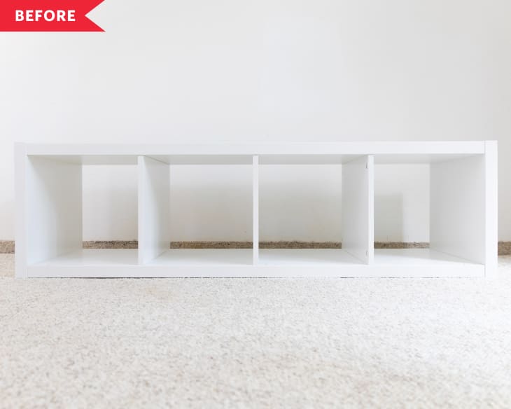 Before: white four-cube IKEA KALLAX shelf laid horizontally on white carpet