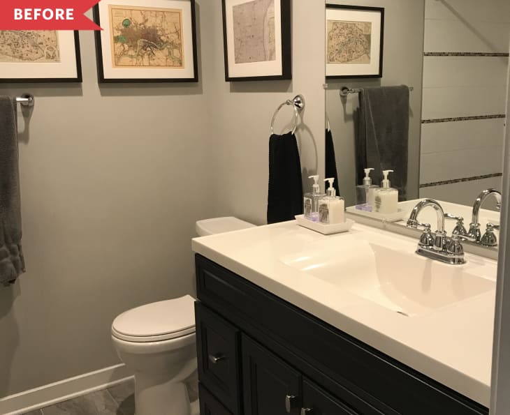 Before: bathroom with gray walls and dark vanity