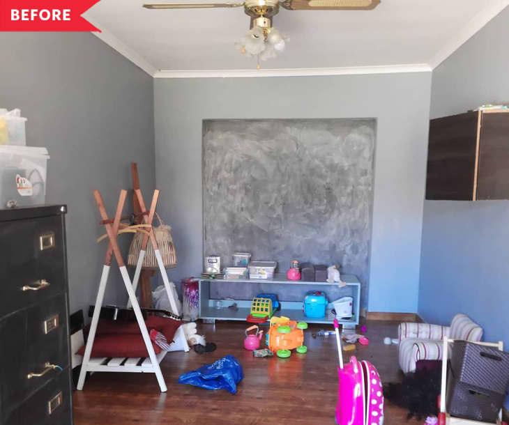 Before: Play room with toys on floor, dusty chalkboard wall, and black filing cabinet