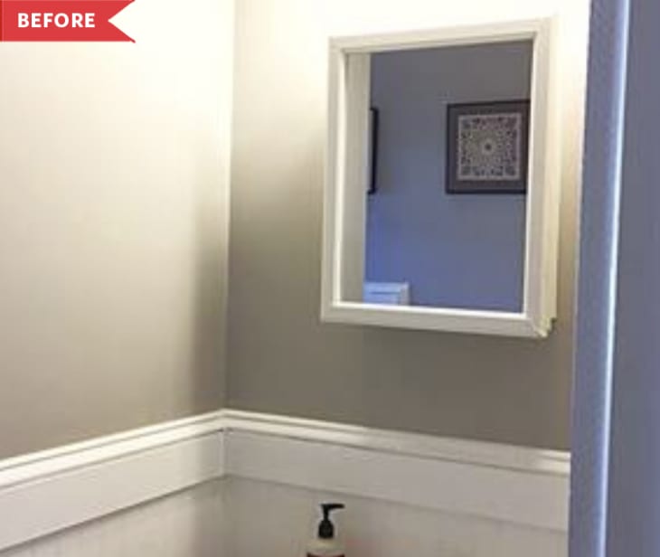 Before: Corner of bathroom with rectangular mirror/medicine cabinet and tan walls