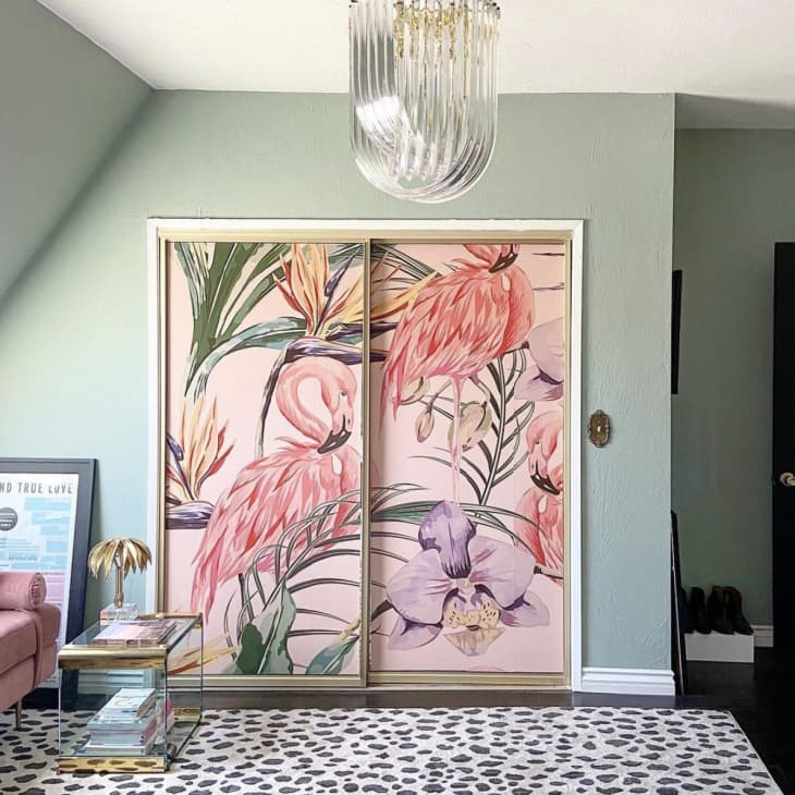 closet doors covered in pink flamingo mural