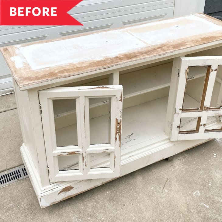 Before: Lower half of faded, chipped white hutch with glass front cabinet doors