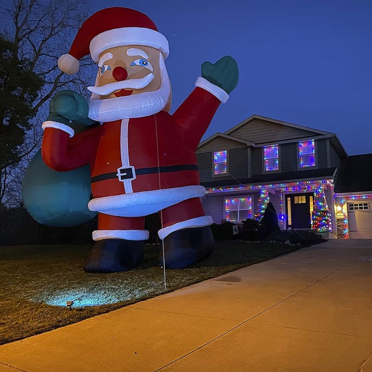 Giant Santa inflatable in front of house