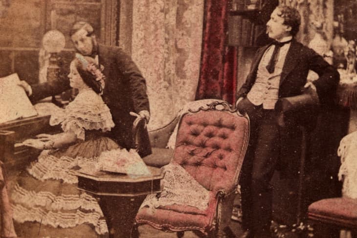 circa 1860:  A woman plays the piano in a Victorian parlour.  (Photo by Otto Herschan Collection/Hulton Archive/Getty Images)