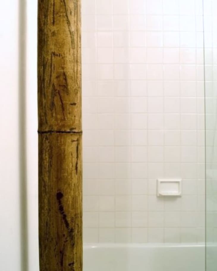 Hide Laundry Room Plumbing with covering bamboo look