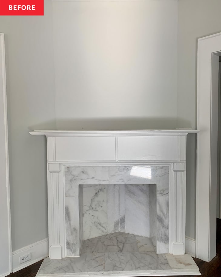 White fireplace before redecoration.