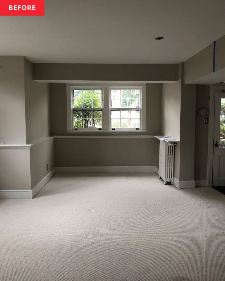 Window of empty room in former doctors office before renovation.