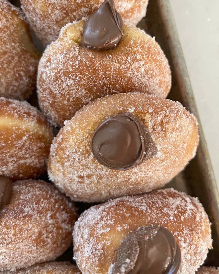 Bomboloni (Italian Donuts) with chocolate cream filling and a sugar dusted coating