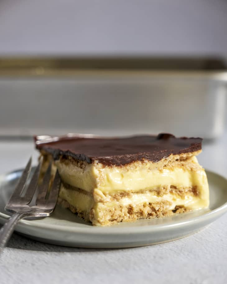 A photo of a slice of chocolate eclair cake.