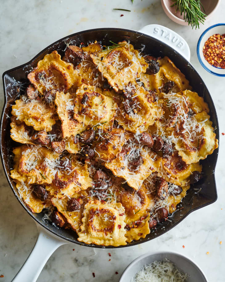 Crispy Skillet Ravioli with Garlic Butter Mushrooms in a skillet on a table