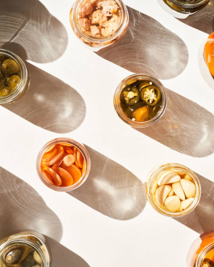 Glass jars with assorted pickled products
