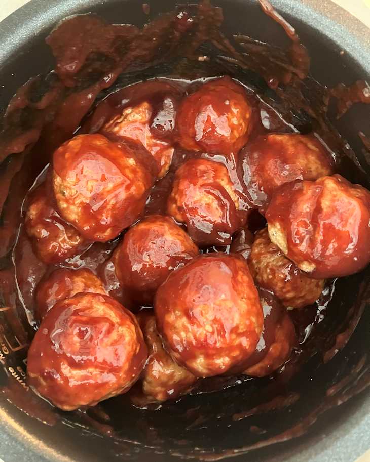 Marinaded meatballs in slow cooker.