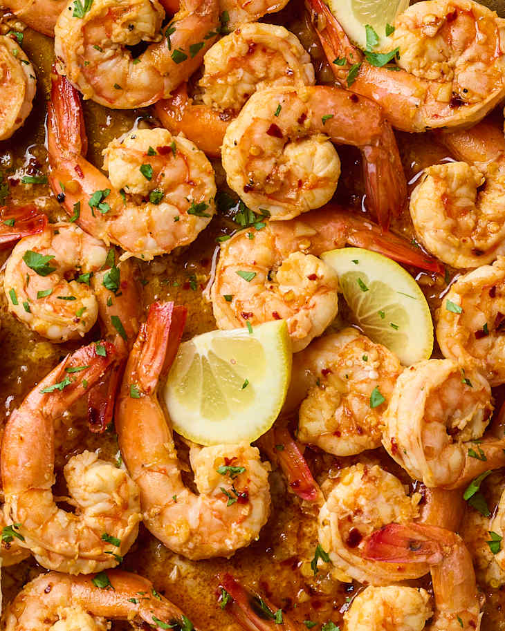 spicy lemon garlic shrimp with lemon wedges