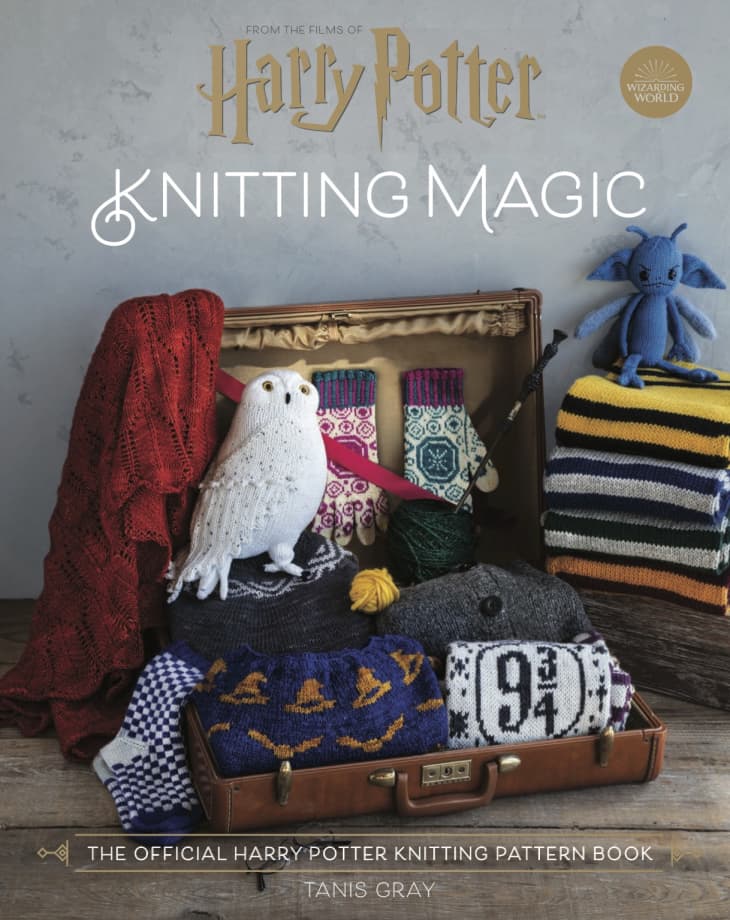 Harry Potter-themed knitting items in a suitcase, including an owl, scarves, and a blue creature.