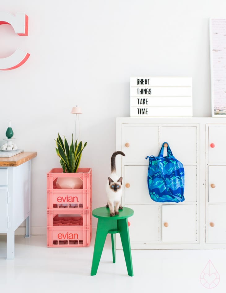 Evian Water Bottle Crates DIY Decor Hacks Pink Apartment Therapy