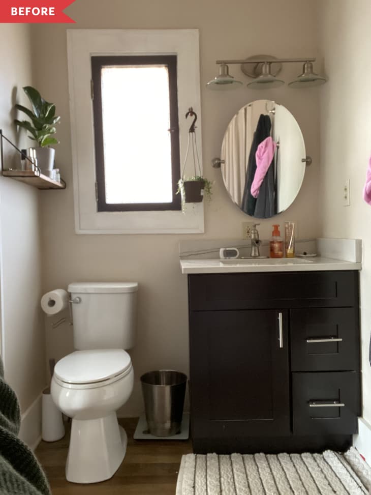 Before: Beige bathroom with black vanity