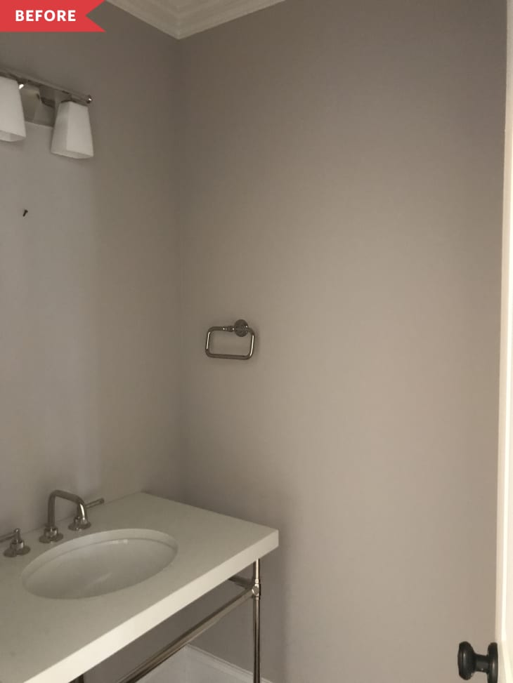 Before: Bare powder room with beige walls