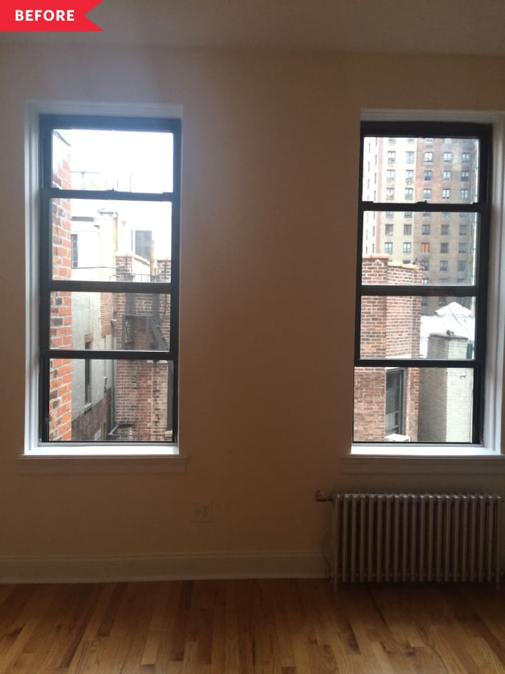 Before: A studio with blank white walls and bare wood floors