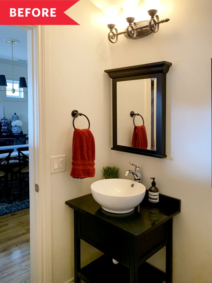 Before: Simple bathroom with beige walls and dark vanity