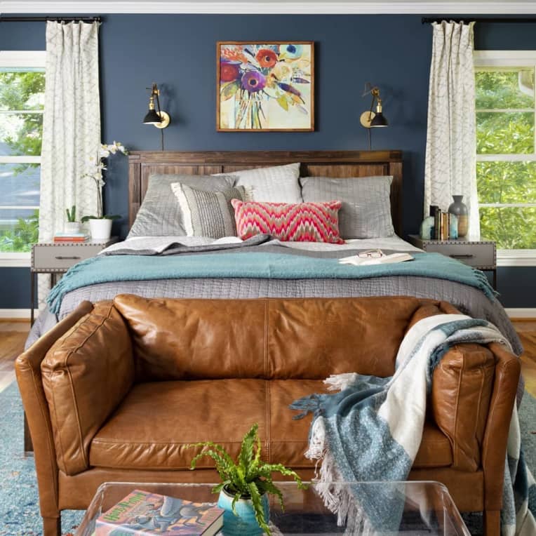 Loveseat at the foot of a bed
