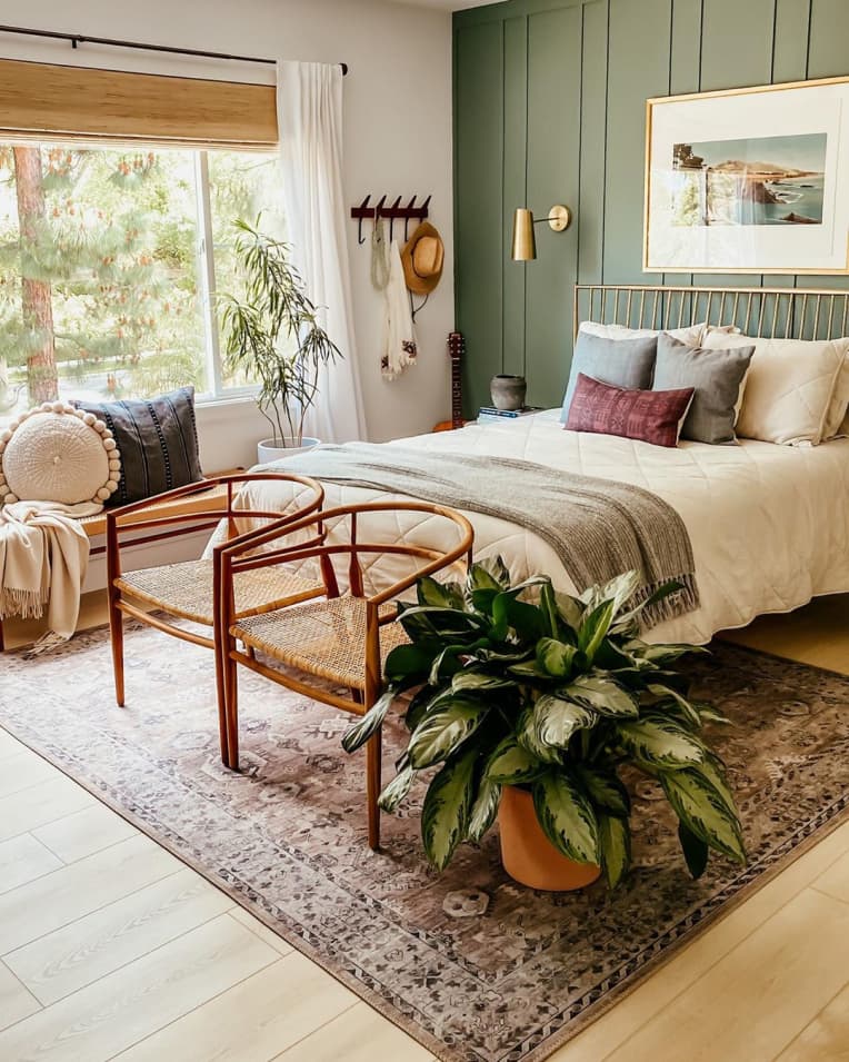 Bedroom with chairs at the foot of the bed