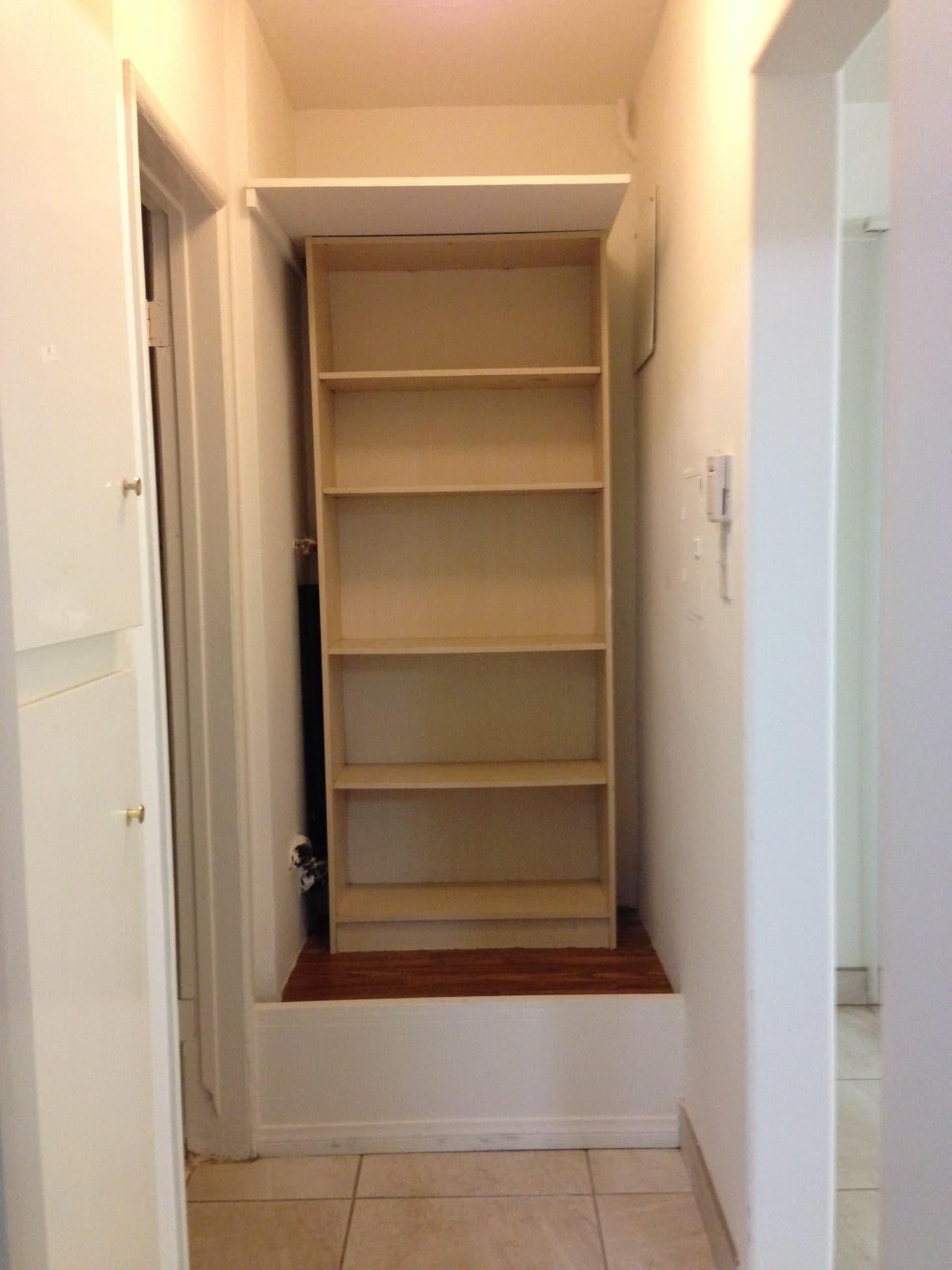 How to Spruce Up an Ugly Permanent Bookshelf? Apartment Therapy