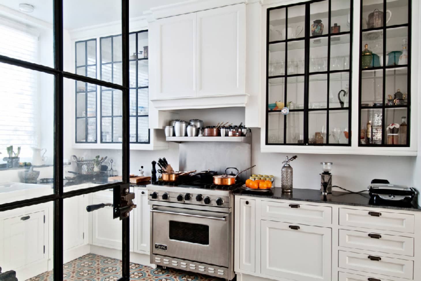 black kitchen wall cabinet with glass door