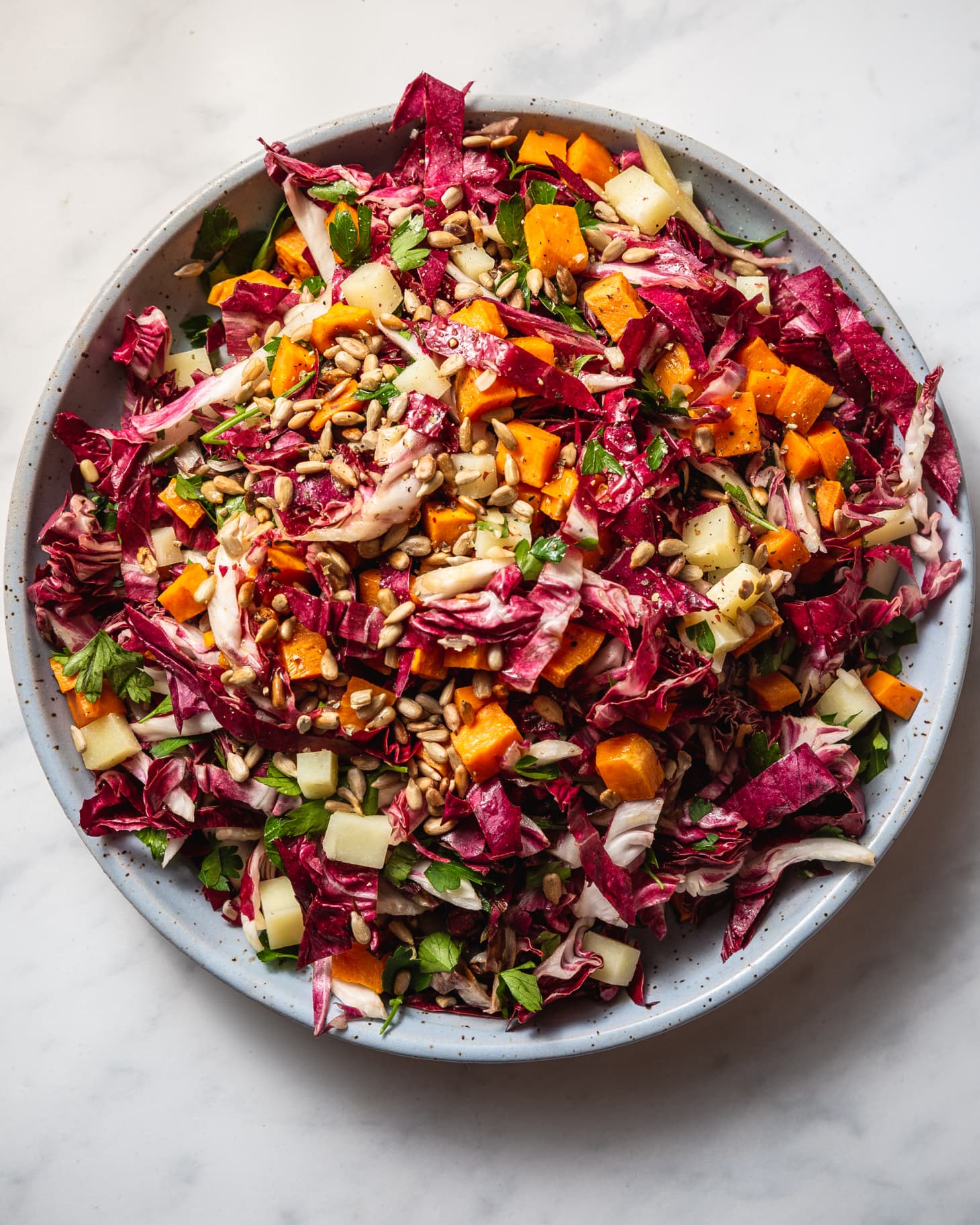 Raw and Roasted Radicchio Salad with Sweet Potato, Manchego, and