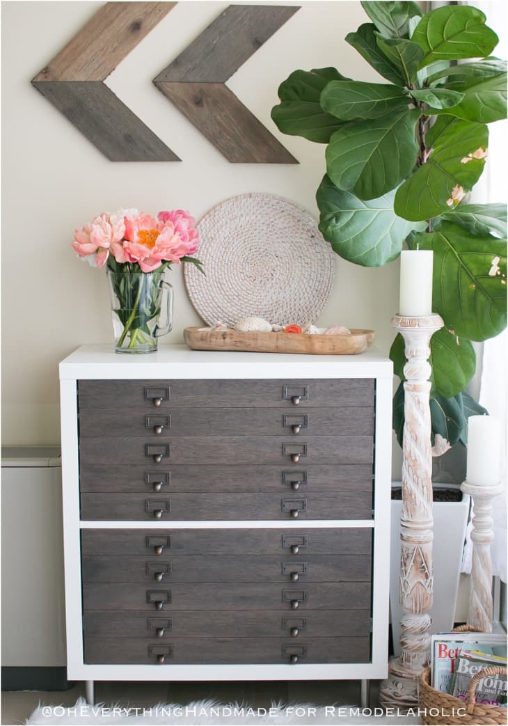 White IKEA KALLAX with brown flat file drawers