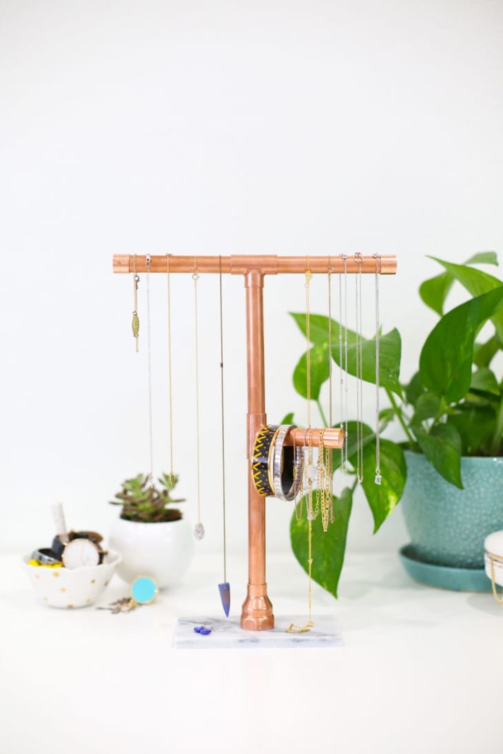 Tabletop copper pipe necklace holder