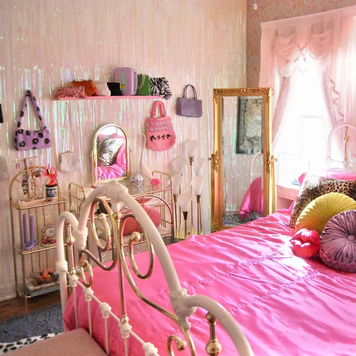 a bedroom with shades of pink, from hot pink to pale pink