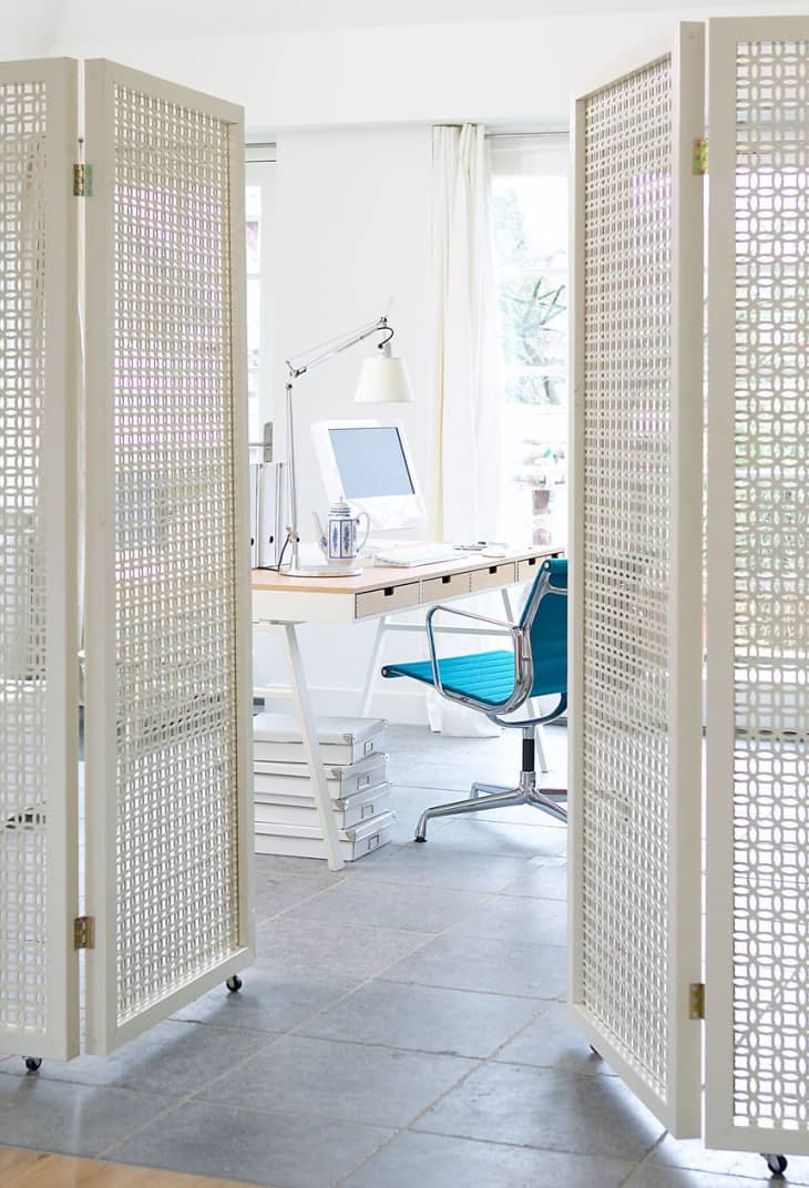 Modern retro white folding screens in the office