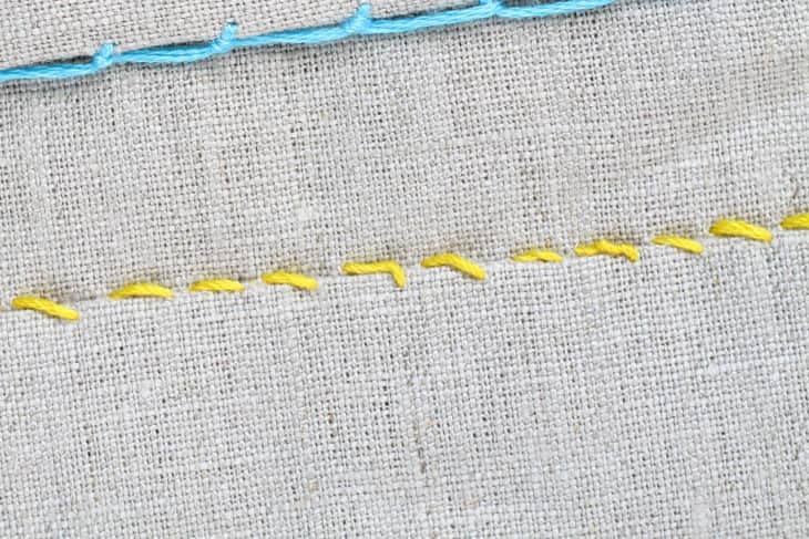 whipstitch in yellow thread.