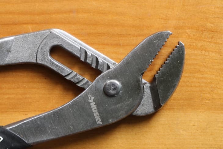 adjustable pliers on a table