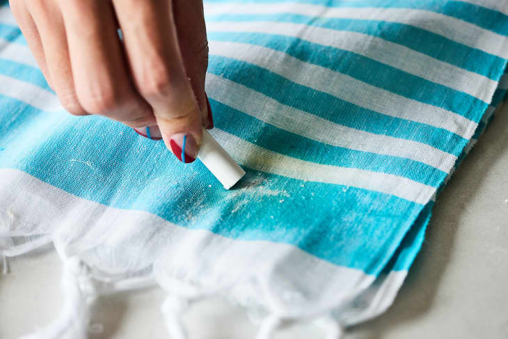 Here's How to Get Oil and Grease Stains Out of Your Clothes