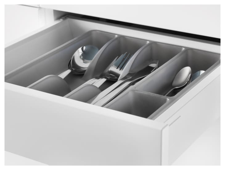 A SMÄCKER flatware tray from Ikea stores utensils in order