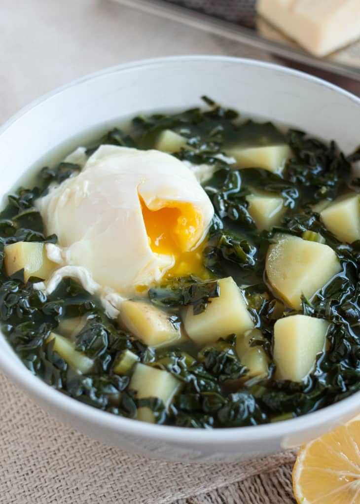 Kale and potato soup in a bowl