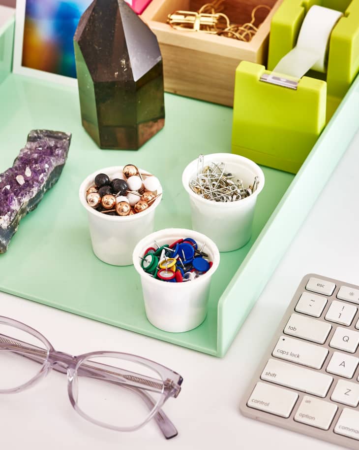 old coffee pods holding desk accessories