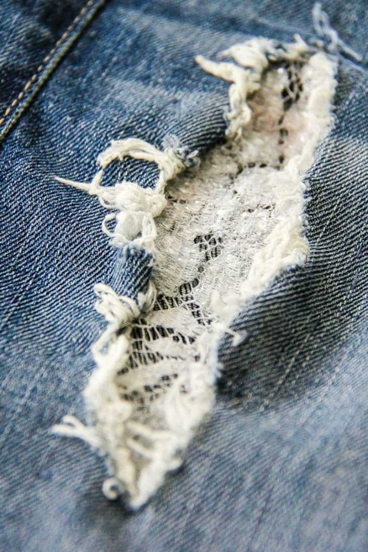 ripped jeans with material underneath