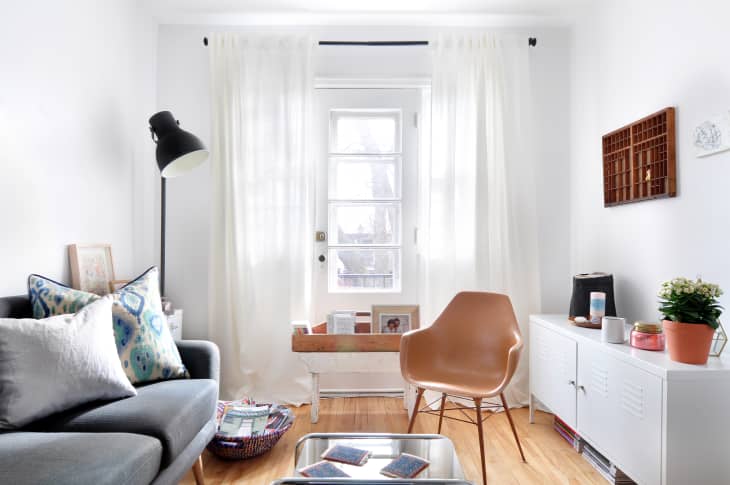 Living room with floor-to-ceiling drapes