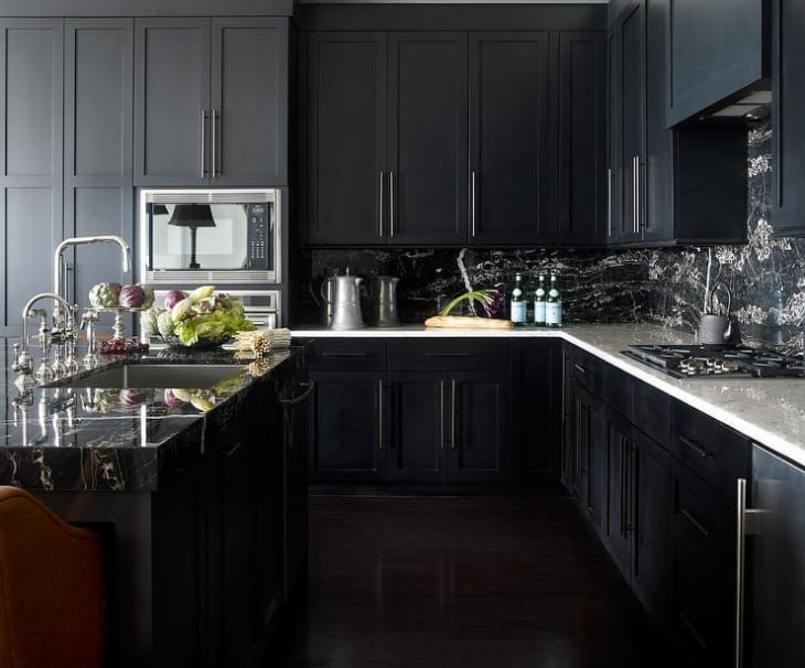 Black kitchen cabinet with marble kitchen island