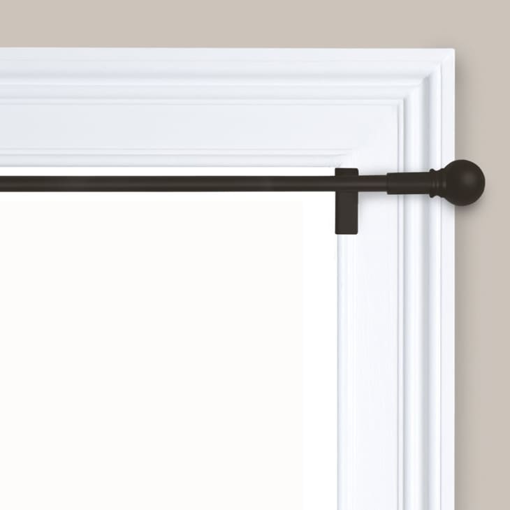 twist and fit curtain rods in window