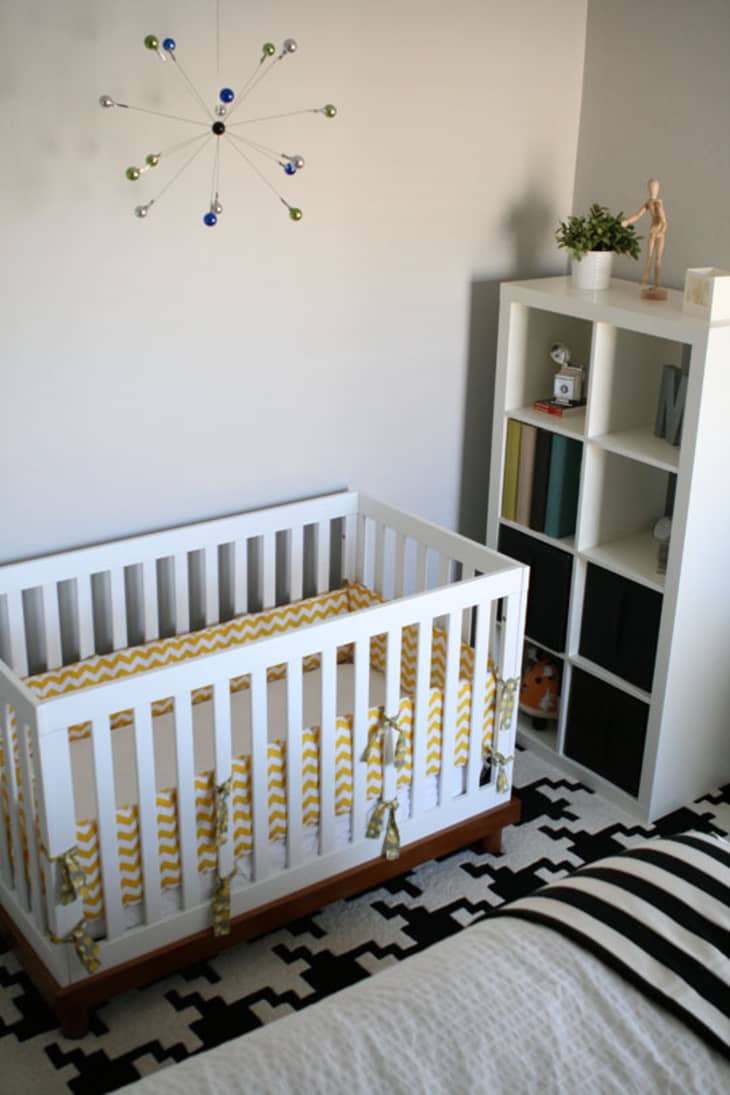baby room with guest bed