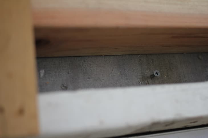 Drill screws are dropped on the floor (backerboard) at every joint and about every foot