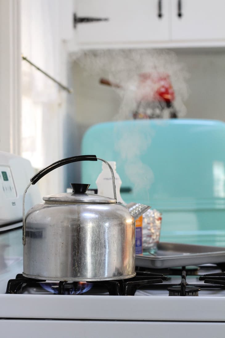 A Kettle on a gas stove