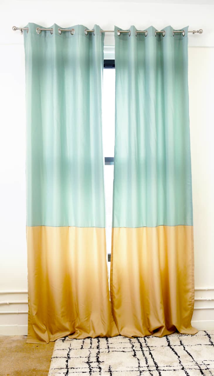 Lighter blend of turquoise and yellow fabric curtains