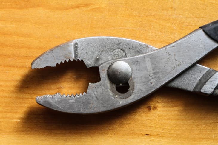 rusted pliers on a table