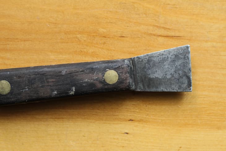 metal scraper with wooden handle